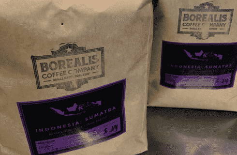 Brown bag filled with delicious local coffee beans from Borealis Coffee Company.