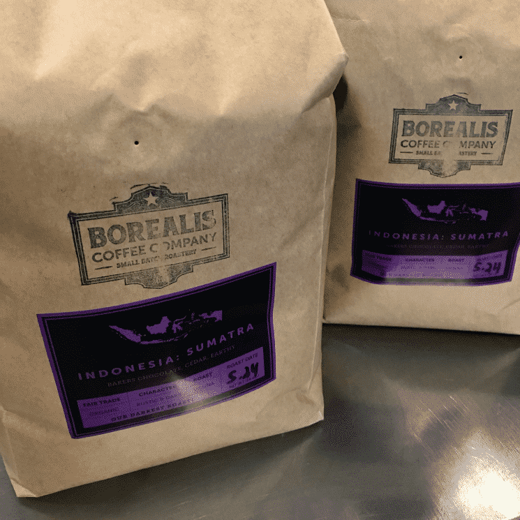 Brown bag filled with delicious local coffee beans from Borealis Coffee Company.