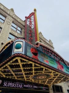 The brightly lit marquee sign of the PPAC.