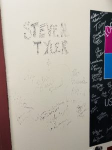 Steven Tyler and his band's autograph on a wall inside PPAC.
