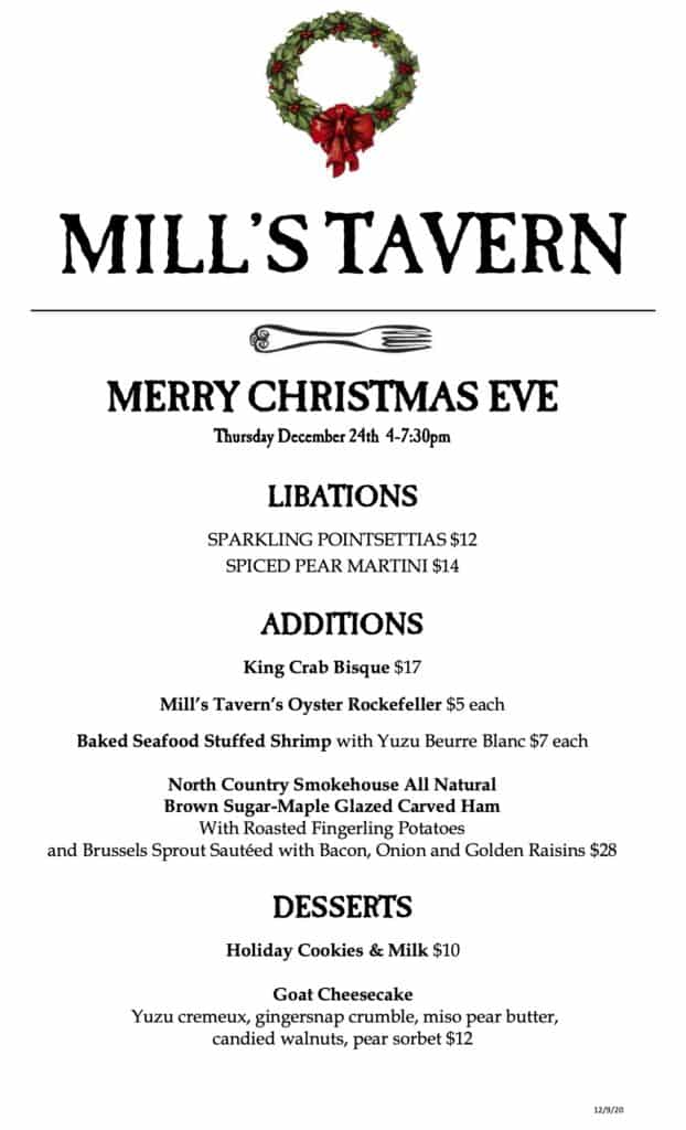 A white restaurant menu with black lettering featuring a christas wreath at the top center.